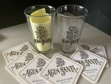 (2) NEW Agua Santa Brewing Beer Pint Glasses & 10 Bar Coasters Coaster Lot