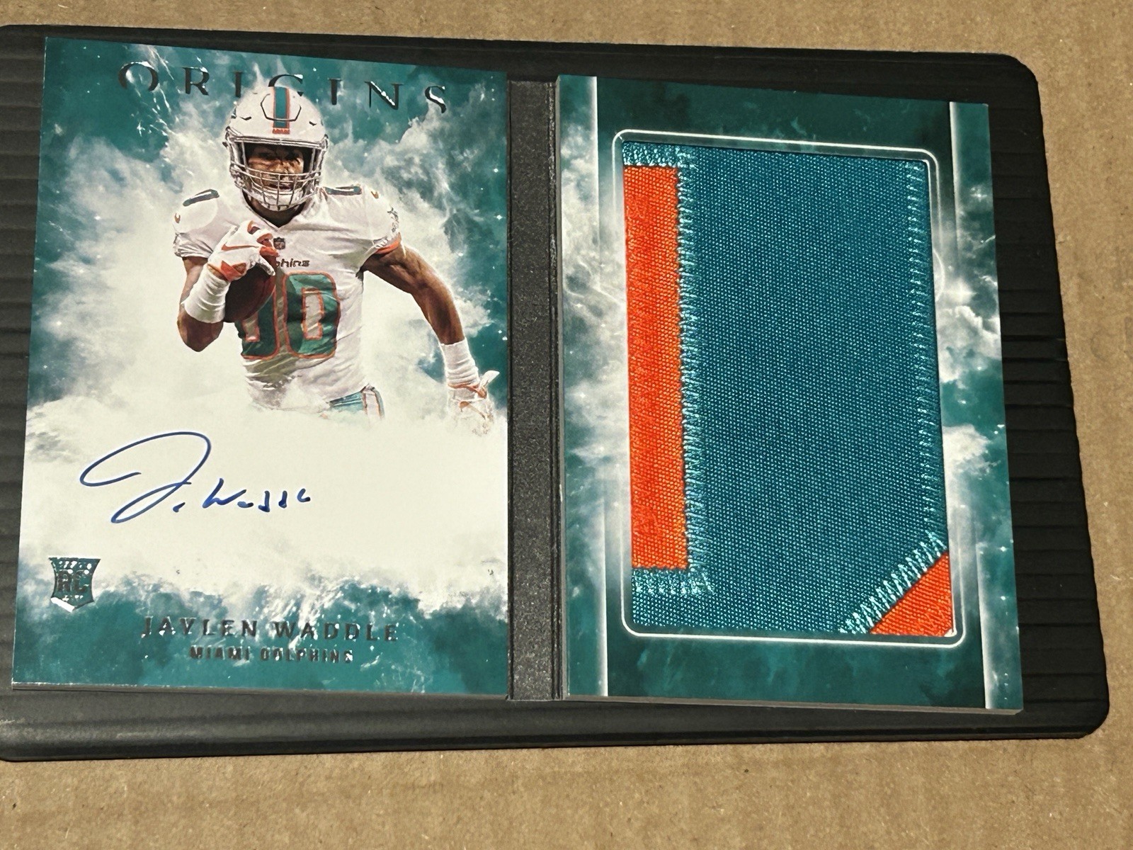 Jaylen Waddle 2021 Panini Origins Rookie Auto Jersey Patch Booklet RBA-JW /49