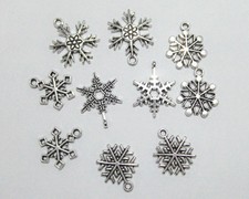 10pz  ciondoli charms di Natale fiocchi di neve 19x16mm-25x19mm colore tibet