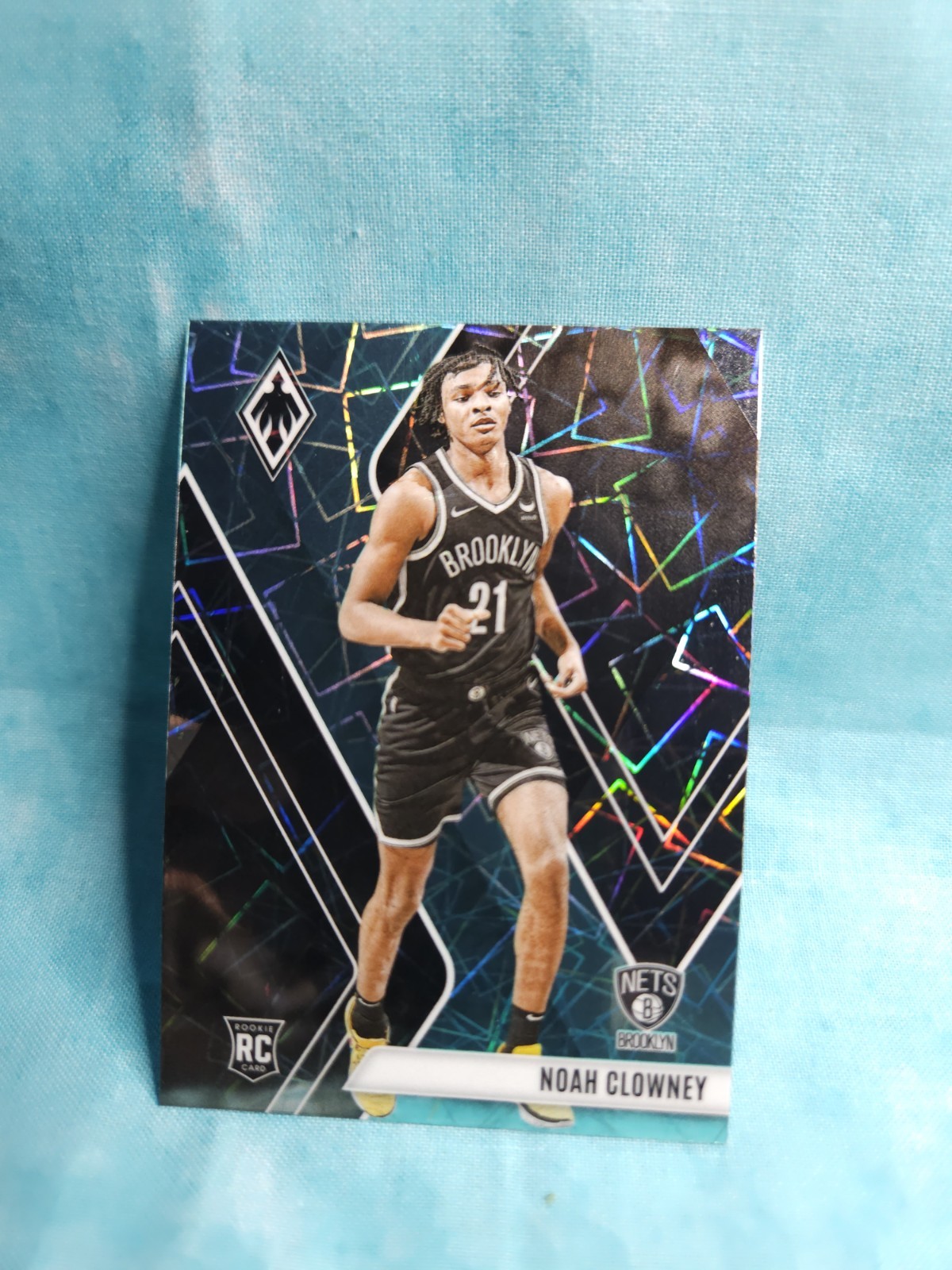 2023-24 Panini Phoenix - Rookies Noah Clowney #286 Teal Lazer Phoenix (RC)