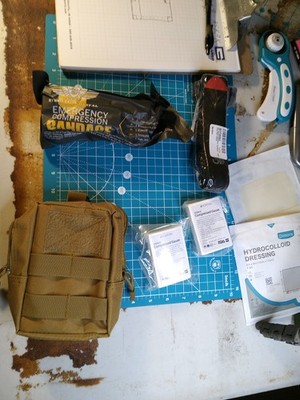 severe bleeding trauma first aid kit bag, includes CAT TQ, compressed gauze, izz
