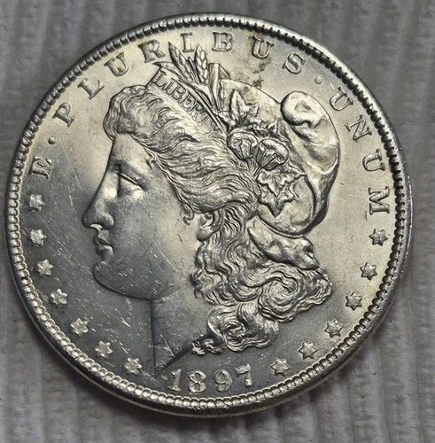 1897 P Morgan Silver Dollar. Many Die Cracks. Estimated Uncirculated 63. A0504