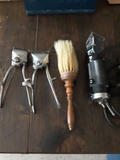 Vintage barbershop haircut items, hand clippers, brush, electric clipper