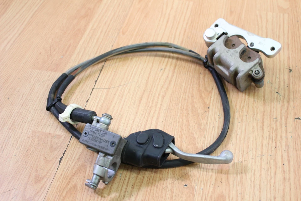 Suzuki RMZ 450 2012 cilindro maestro de freno delantero, pinza y línea Foto 2 de 4