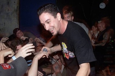 Sick Of It All lead singer Lou Koller get some help from fans whil- Old Photo 7