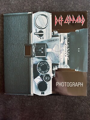 Def Leppard Autographed Photograph Vinyl 45 Pop Up Camera Sleeve