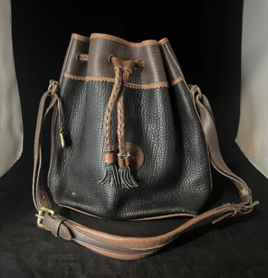 Dooney & Bourke Black and Brown Leather Bucket Bag Dooney & Bourke Tan/Black All Weather Leather Bucket  main image 4