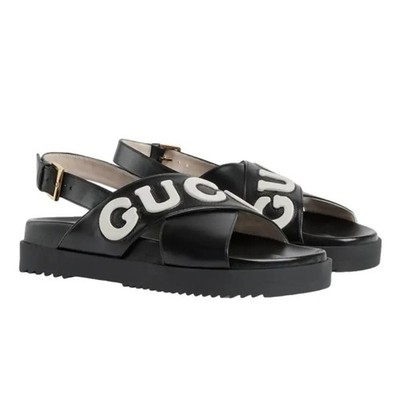 Gucci Black Leather Logo Cross-Strap Sandals with White Lettering