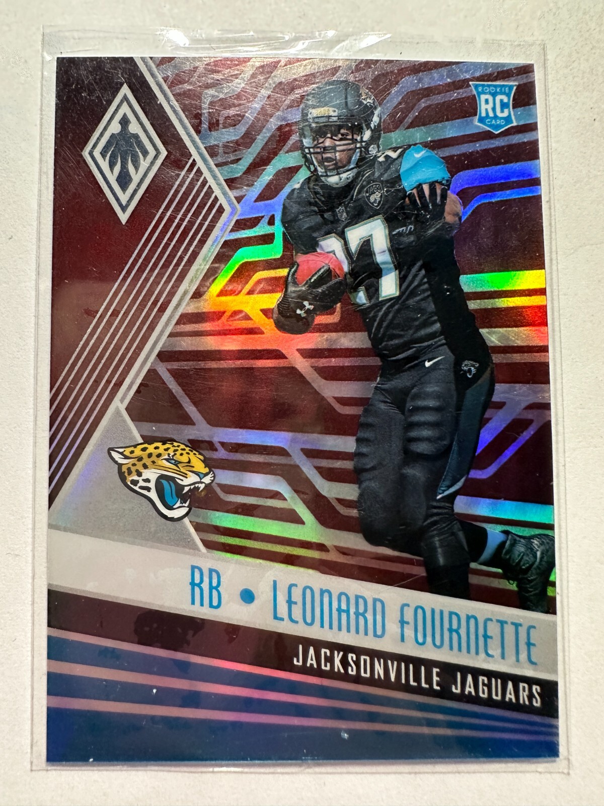 K59,991 - 2017 Panini Phoenix Red #109 Leonard Fournette #/299