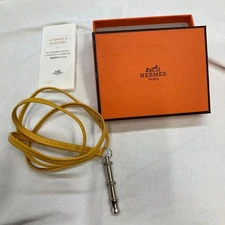 HERMES Chiffre Dog Whistle Metal Leather Necklace Cord Yellow with Box & Manual