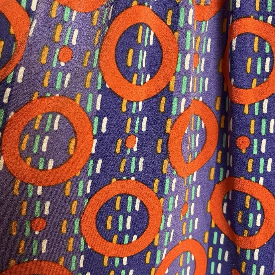 Vestido LuLaRoe Niñas Talla 8 Púrpura y Naranja Estampado Círculo con Mangas de Gorra y Bolsillos Foto 2 de 4