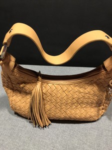leather bolsa with tassels