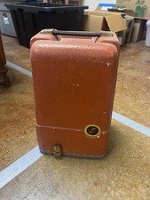 This is a vintage Revere Model 85 8mm movie projector.