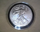 2014  SILVER  EAGLE  IN BRILLIANT UNCIRCULATED CONDITION BELOW SILVER VALUE
