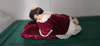 10'' sleeping porcelain doll red felt dress with red pillow
