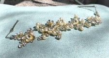 Gold and pearl hair accessory with rhinestones