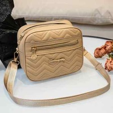 CAMERA BAG, BEIGE WITH ADJUSTABLE STRAP. GREAT FOR SMALL TO MEDIUM CAMERAS.