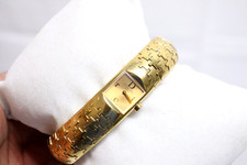 Reloj Christian Dior para mujer D96-150 Diorific esfera pata de gallo tono dorado