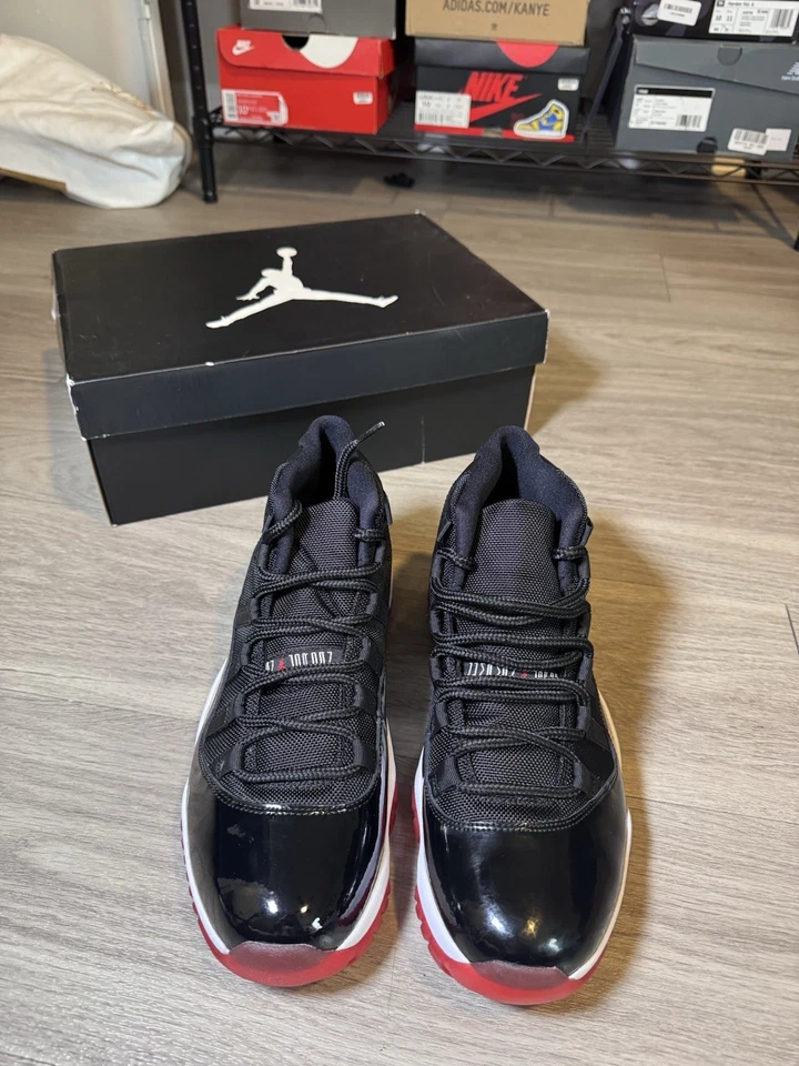 AIR JORDAN XI 11 RETRO 2012 USADO TALLA 9.5 CRIADO NEGRO ROJO UNIVERSITARIO 378037 010 NUEVO Foto 2 de 4
