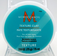 Moroccanoil Texture Clay, 2.6 Fl. Oz Someone put there finger in it See Picture
