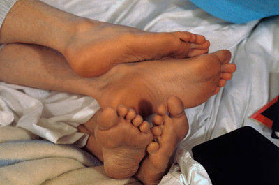 Close up feet musicians John Lennon Yoko Ono bed during their Bed - Old Photo