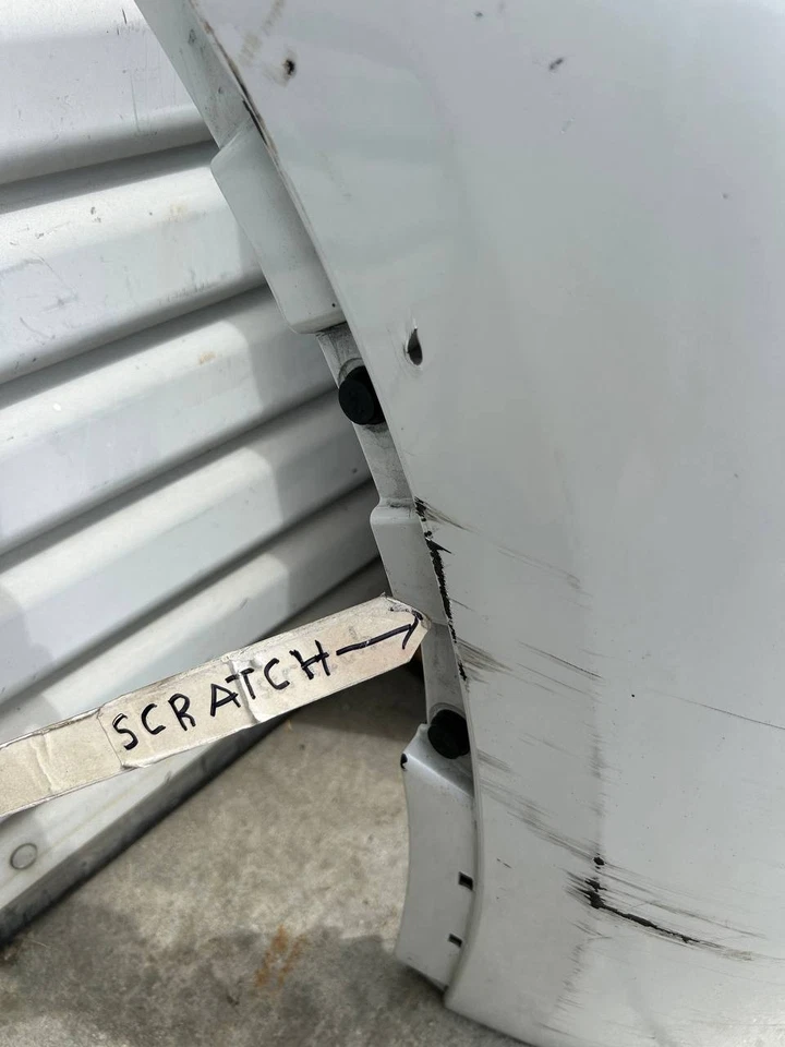 Cubierta de parachoques delantero 22-24 Tesla modelo Y 1687994-TX-A OEM blanca con arañazos Foto 3 de 4