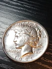 1921 Peace Silver Dollar. Rim ding. Pretty. No reserve.