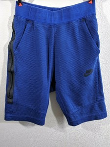 Nike Tech chicos juvenil medio Fleece Pantalones cortos azul | eBay