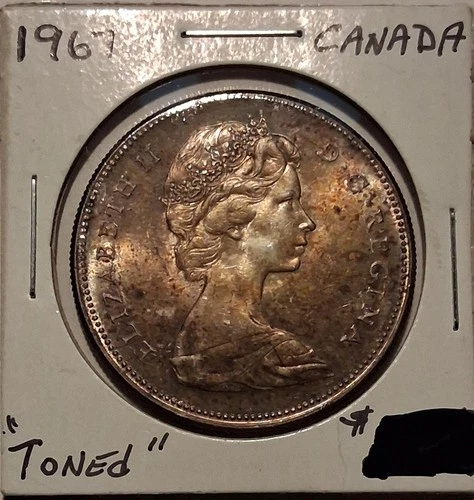 🔥1967 CANADA ONE DOLLAR GOOSE QUEEN ELIZABETH  II 80% TONED SILVER COIN