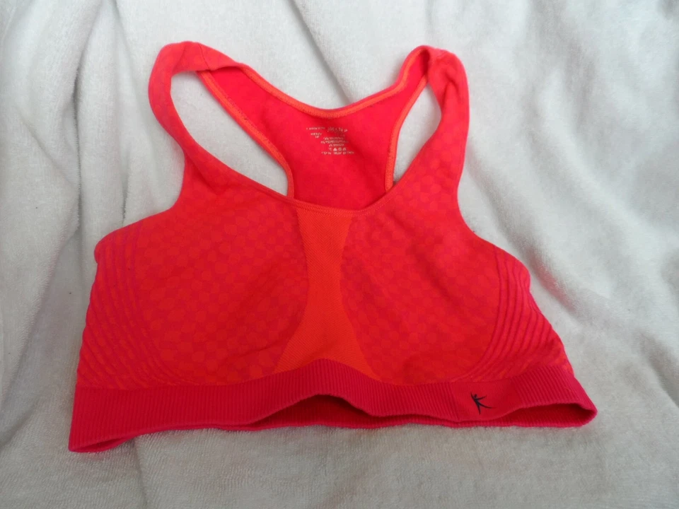 Lote de 2 sujetadores deportivos junior talla 34B de Champion Danskin - azul marino, naranja/rosa Foto 2 de 4