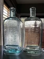 Lote de 2 botellas químicas antiguas Aqua Fellow’s 1890-1910