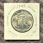 Walking liberty- 1945 uncirculated mint of 66, amazing condition!