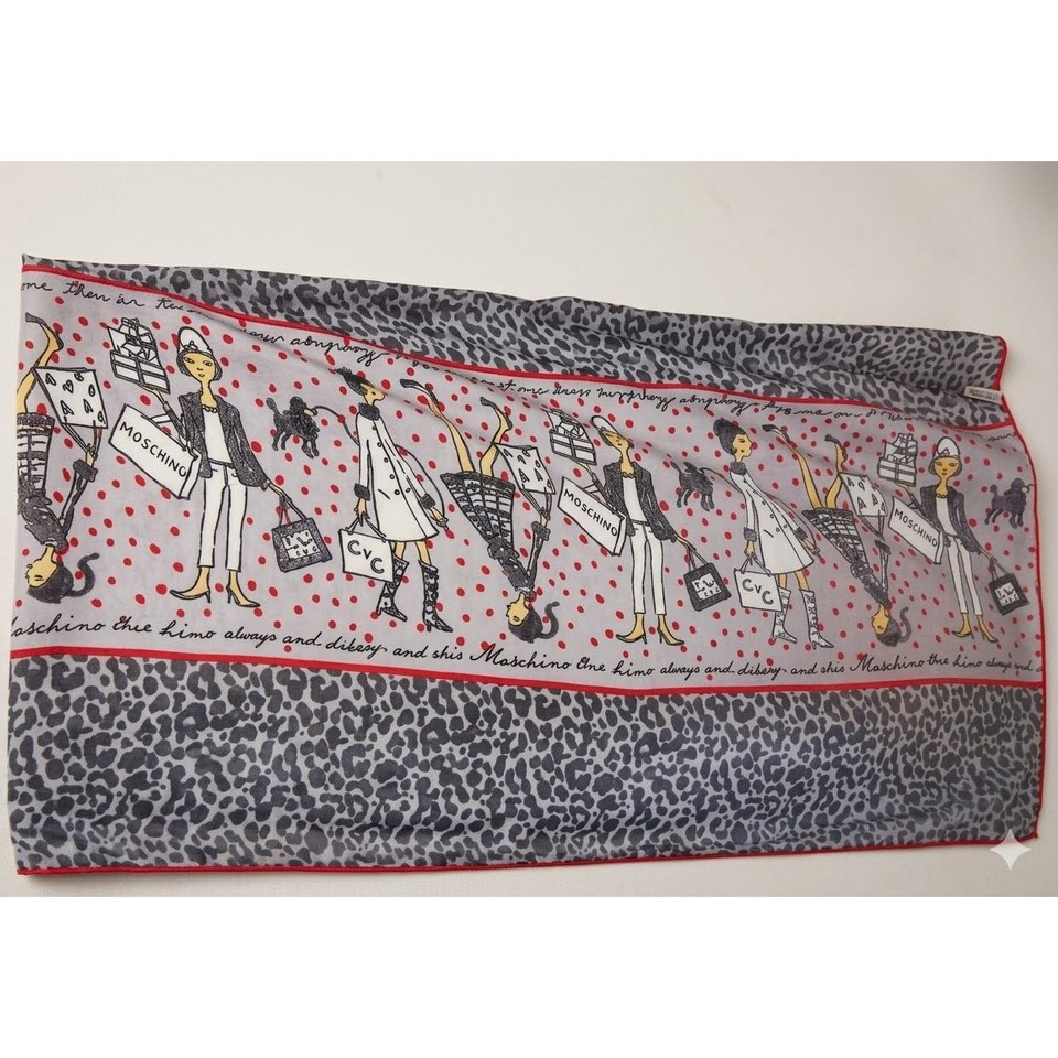 A genuine Moschino Cheap & Chic vintage scarf with leopard border and novelty shopping-girl print — wearable fashion history with serious personality.