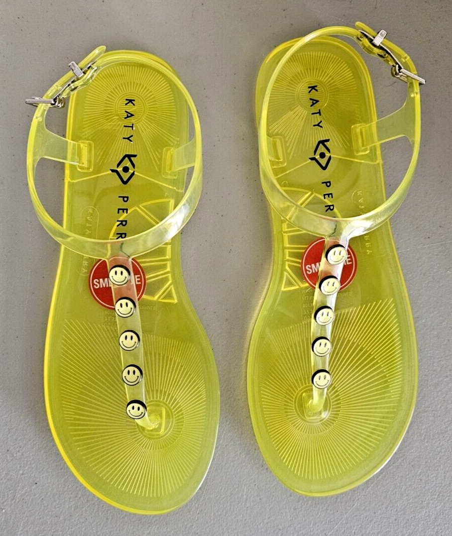 Katy Perry Women's The Geli-T Strap Flat Sandal Smiley Face Lemon