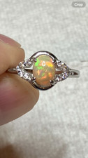 138B- 0.95ct Genuine Ethiopian Welo Opal set in a Size 8.5 Sterling Silver Ring