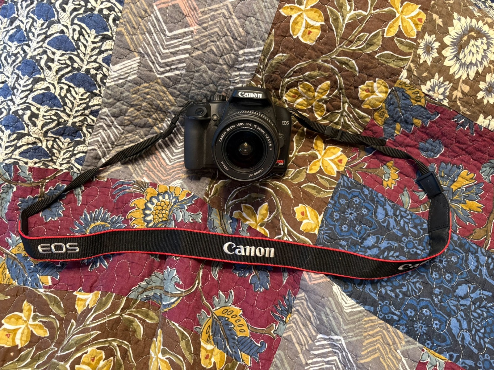 Canon EOS Rebel XS DSLR Camera – 10.1MP – EF S 18 55mm Lens – Strap +2 Batteries