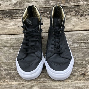 black and gold vans high tops