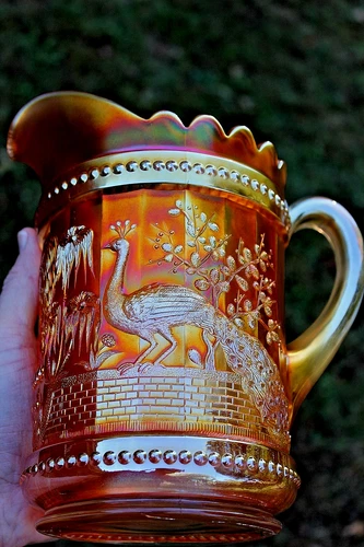 ANTIQUE NORTHWOOD PEACOCK AT THE FOUNTAIN CARNIVAL GLASS PITCHER - MARIGOLD