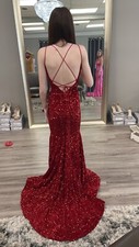 size 00 red prom dress sequins and nude mesh in the sides.