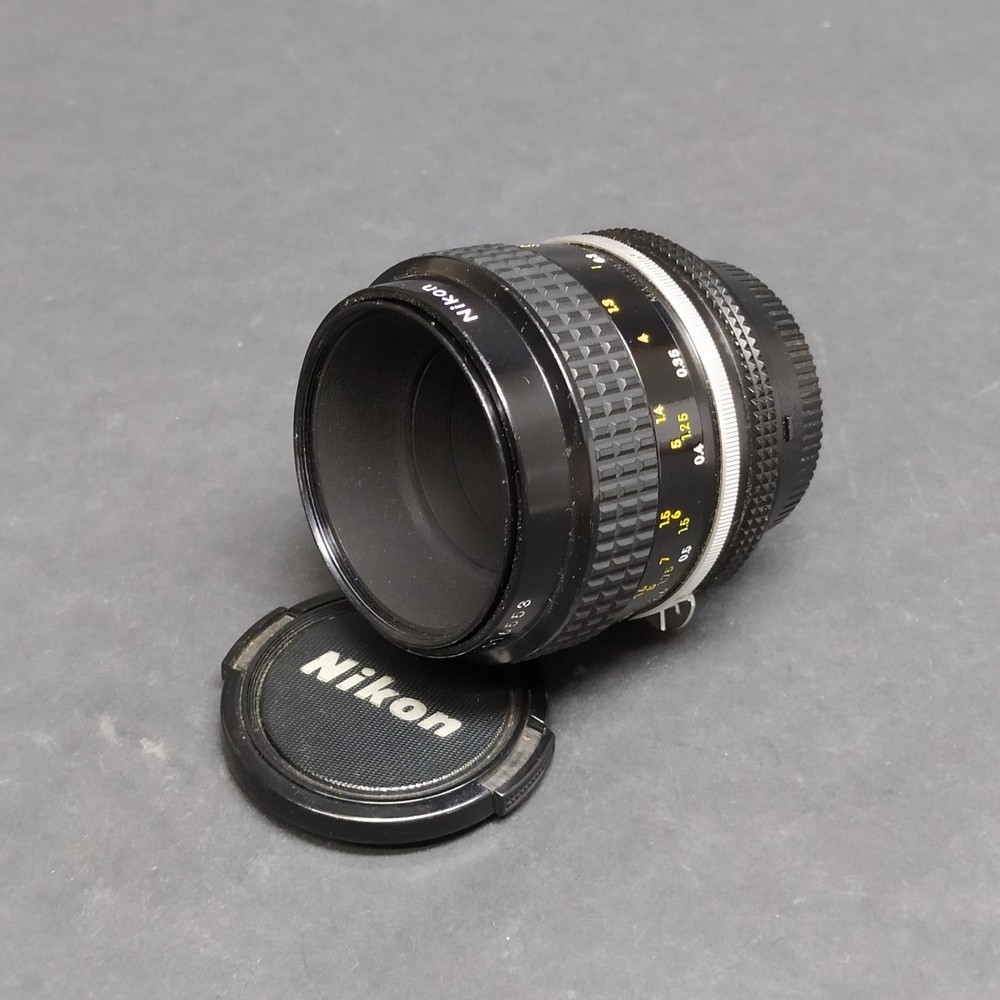 Zoom fotografico Nikon Micro-Nikkor 55mm 1:3,5. Ottiche da pulire
