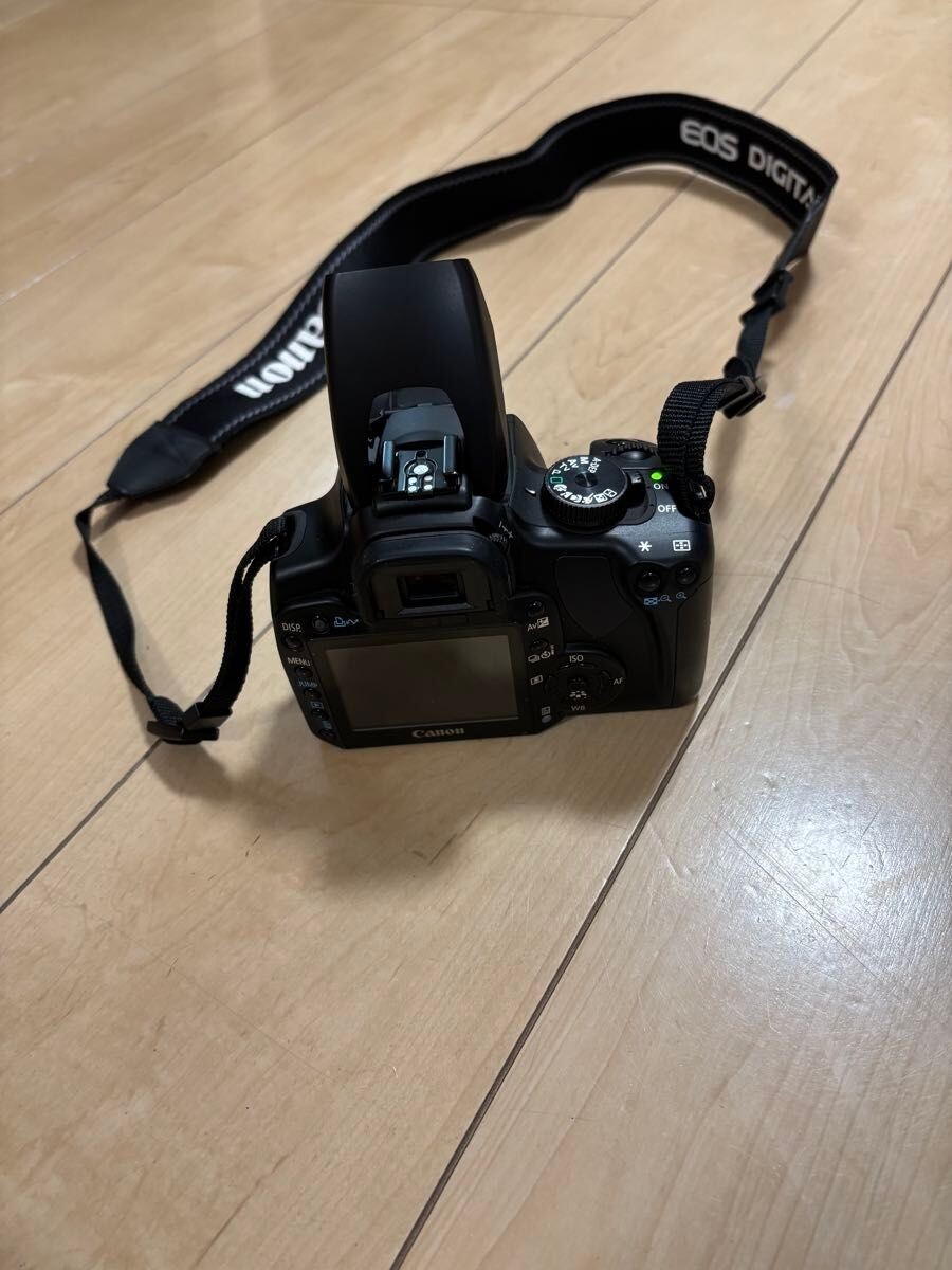 Canon EOS KISS DIGITAL X SLR camera With three zoom lenses