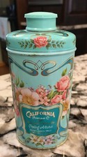 1977 EMPTY AVON CALIFORNIA PERFUME CO TRAILING ARBUTUS TALC POWDER TIN
