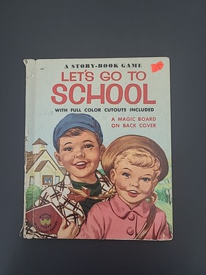 Lets go to school a story book game,A magic board on back cover 1954 vintage