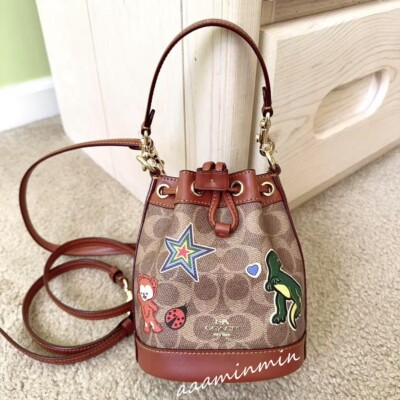 Coach Mini Bucket Bag In Signature Canvas With Sticker Print CW300