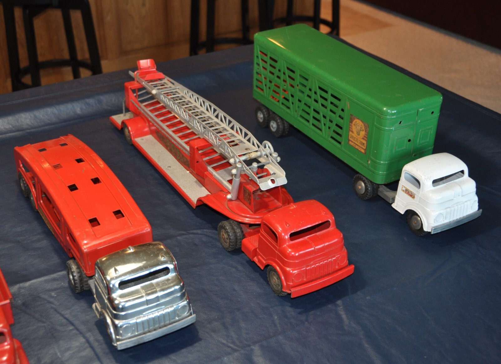 9 Vintage 1950's Structo Toy Trucks, good to very good condition for