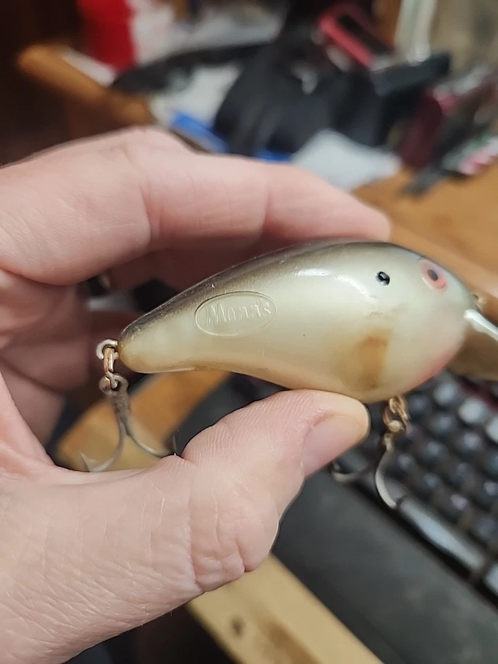 Bonito señuelo de pesca vintage Mann's Fat Albert #30-5367 negro perla 3,5" Foto 4 de 4