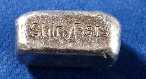 A 1 oz Hand Poured 999 Silver Bullion Bar by Shiny Bars Brand