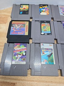 Lote de 12 juegos Nintendo NES Top Gun, Iron Sword, Cobra Triangle, Hydlide, Bad Dudes