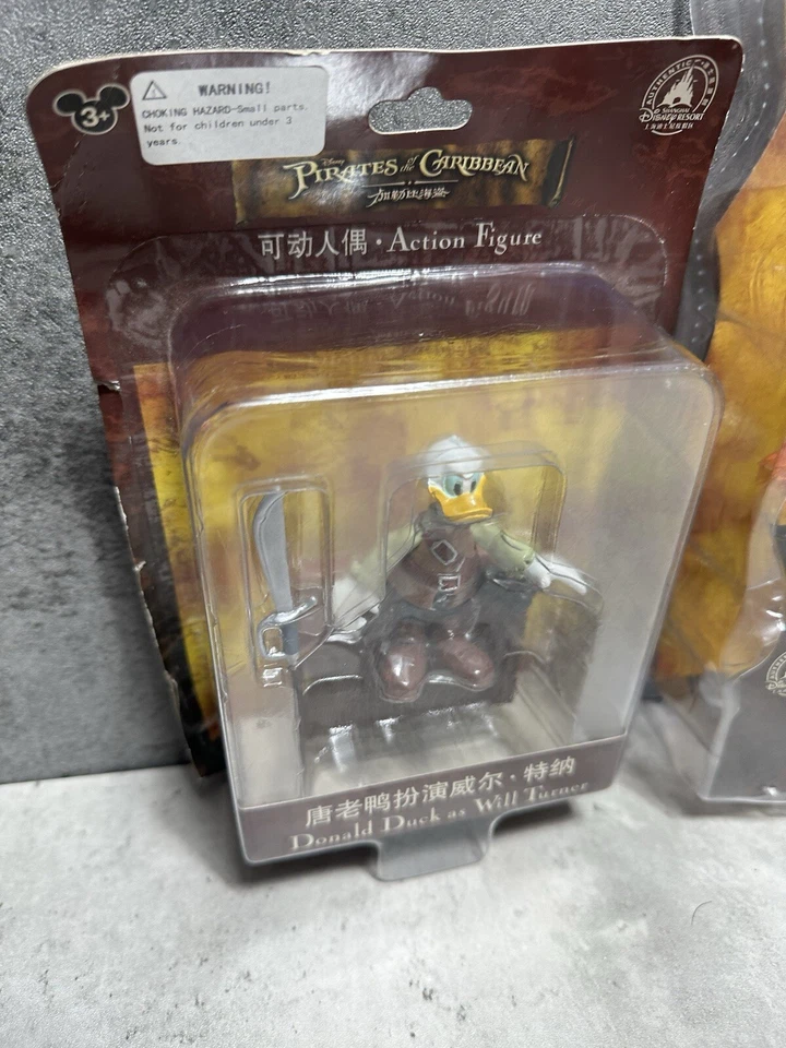 ЛОТ ИЗ 2 ФИГУРОК ДИСНЕЙ ПАРКИ ПИРАТЫ КАРИБСКОГО МОРЯ ДОНАЛЬД УИЛЛ ТОКАРЬ ЛЕБЕДЬ - Изображение 3 из 4