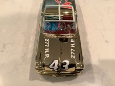 RICHARD PETTY AUTOGRAPHED 1957 OLDSMOBILE CONVERTIBLE GOLD CHROME DIECAST CARD